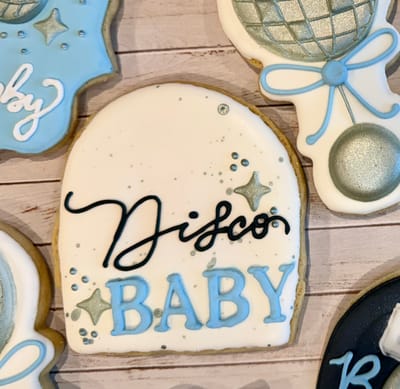 All photos — custom decorated cookies by Dreams of Buttercream