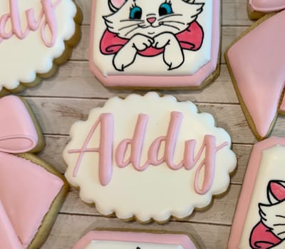 All photos — custom decorated cookies by Dreams of Buttercream