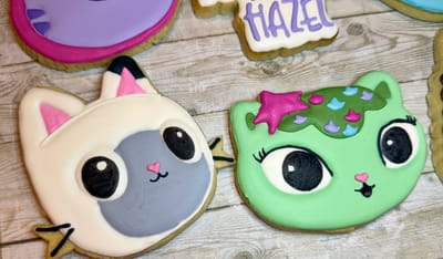 All photos — custom decorated cookies by Dreams of Buttercream